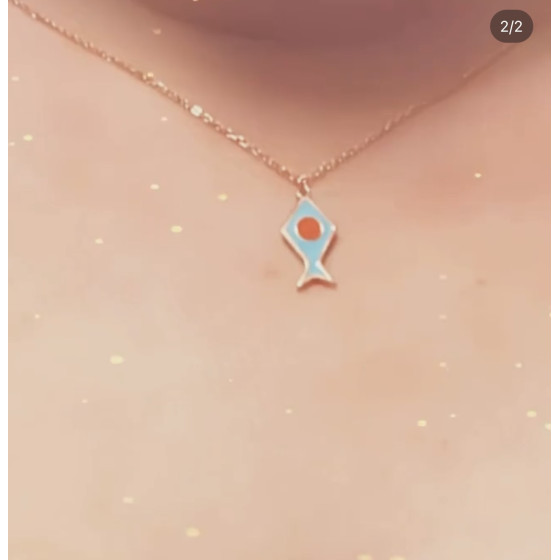 Fiskene stjernetegn halskæde med et forgyldt sølvvedhæng, der fremhæver fiskens unikke design